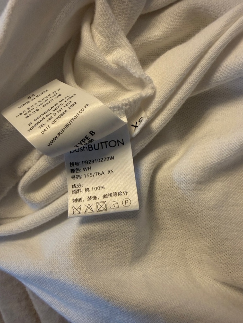 Pushbutton White Structural Drape-Back Button-Up Top - Picture 5 of 16